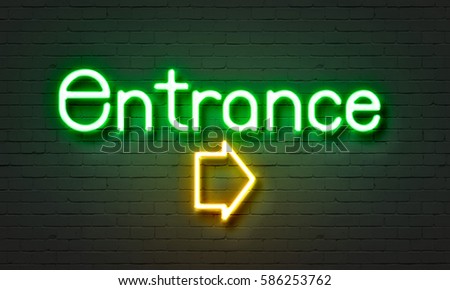 Entrance neon sign on brick wall background