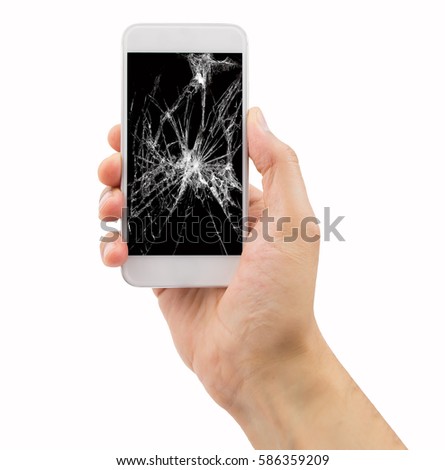 Hand with modern touch screen smart phone and broken screen isolated on white background.
