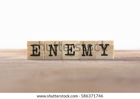 Enemy Word Written In Wooden Cube