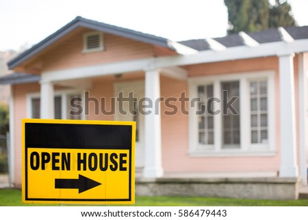 Open House Sign in Front of a Home