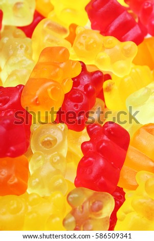 
Gummy bear background. Gummy bears as texture. Gum bear candy colorful pattern.