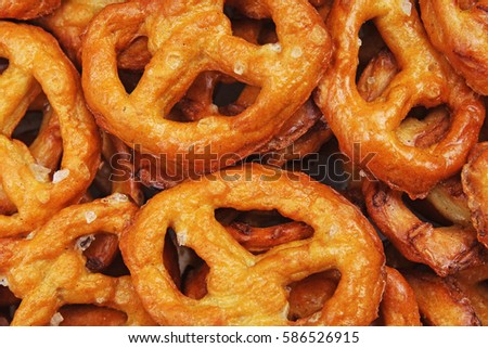 Pretzel shaped bread sticks cracker texture pattern. Salted pretzels.