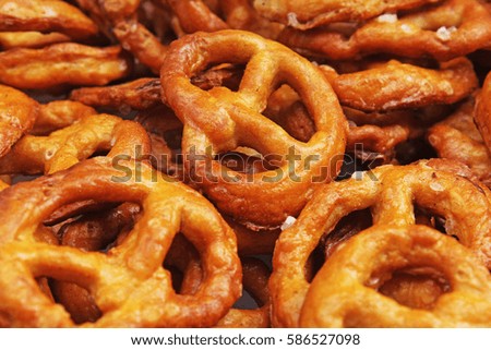 Pretzel shaped bread sticks cracker texture pattern. Salted pretzels.