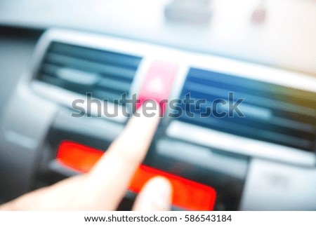 Picture blurred  for background abstract and can be illustration to article of hand press emergency light button