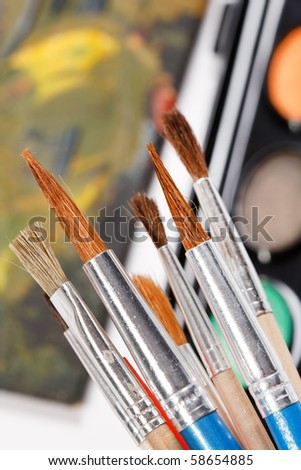 paints with brushes