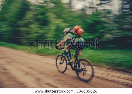 Bike race (motion blur) Royalty-Free Stock Photo #586635626