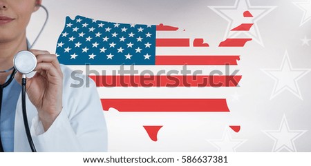 Close-up of female doctor holding stethoscope against united states of america map with flag