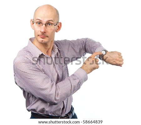 Emotional young man shows at wristwatches Royalty-Free Stock Photo #58664839