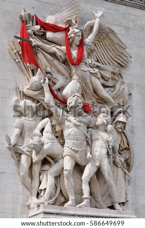 Red drape on the triumphal arch Arc de Triomphe at the centre of the Place Charles de Gaulle, in Paris, France.