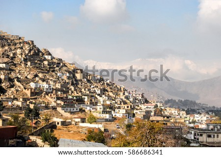 Informal settlements in kabul Afghanistan on a hill Royalty-Free Stock Photo #586686341