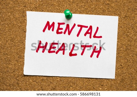the inscription the concept of "mental health" on cork Board