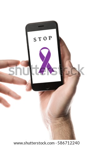 Hand holding smartphone, blank screen with purple ribbon isolated on white background. World Cancer Day graphic. Pancreatic cancer, honors cancer, leiomyosarcoma cancer concept