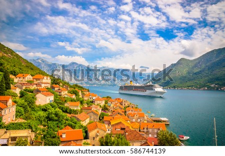 Beautiful mediterranean landscape. Cruise ship near town Perast, Kotor bay (Boka Kotorska), Montenegro. Royalty-Free Stock Photo #586744139