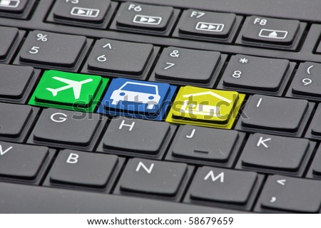Keyboard with keys to book flight, rental car and hotel - online booking concept Royalty-Free Stock Photo #58679659