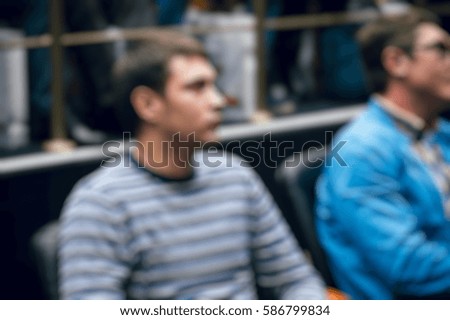Abstract blur background of people in group meeting in convention hall