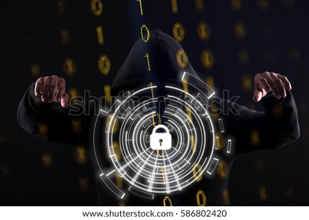 Computer hacker silhouette of hooded man with binary data and network security terms