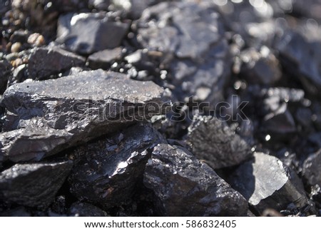 Closeup image of coal pieces. Background. Concept of heating, mining, miners Royalty-Free Stock Photo #586832405