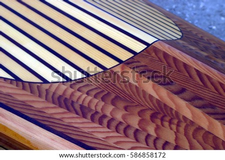 close up of wooden strip built kayak