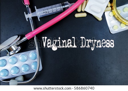 Vaginal Dryness word, medical term word with medical concepts in blackboard and medical equipment background.