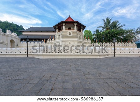 Temple of the Sacred Tooth Relic at Kandy, Sri Lanka Royalty-Free Stock Photo #586986137