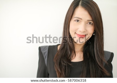 Beautiful business woman isolated and portrait: She get beautiful smile on her face. Attractive businesswoman has confident and happy. Charming beautiful woman feel happy and determined. copy space