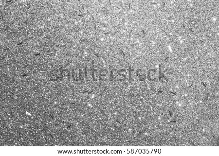 Silver glitter abstract bokeh background bright