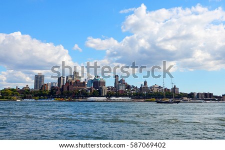 Brooklyn skyline and sailing ship on east river as seen from Wall Street, Manhattan, New York