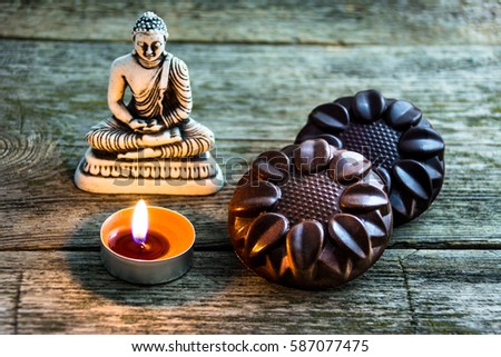 natural chocolate mandala handmade near the Buddha statues