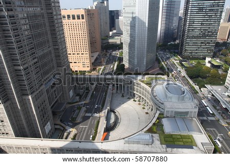 Tokyo scene around city hall at daylight. All trademarks and sign boards are blurred or erased. Royalty-Free Stock Photo #58707880