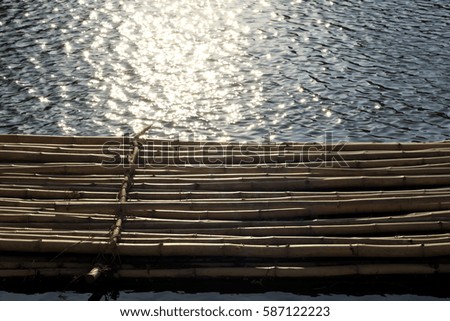 Bamboo raft in pool