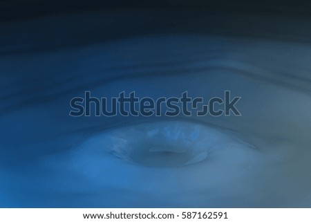 water droplet falling and hitting surface