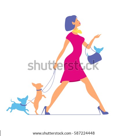 Young fashionable woman in  pink dress is walking with dogs