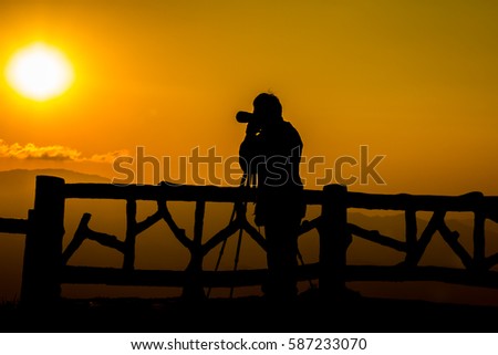 Silhouette of people having fun at sunset time