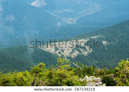 view that opens from the mountain Chomiak Ukrainian Carpathians. altitude 1542 meters, tourist attractions, fog and clouds