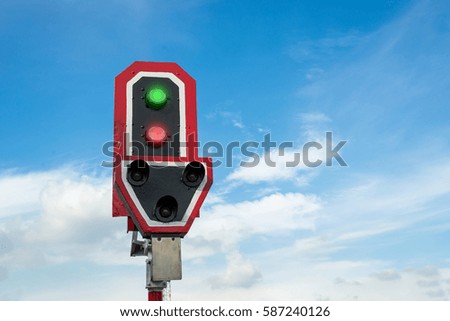 Traffic signs on the rails with blue sky background