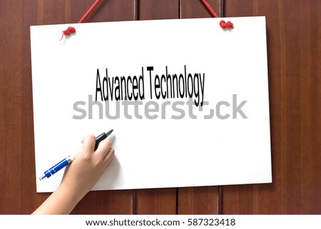 Advanced Technology -  Hand writing word to represent the meaning of Business word as concept.