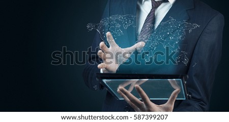 man hand tablet with world map on screen