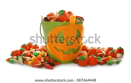 Heap of assorted jelly sweets in bucket  on white background