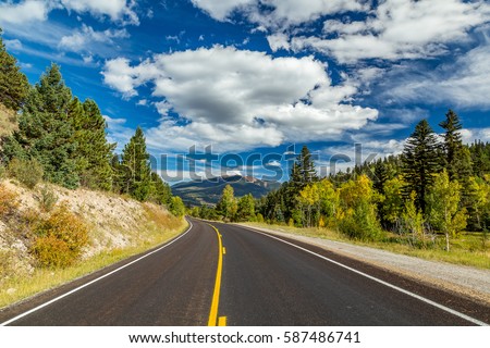 The Enchanted Circle Scenic Byway is an 84 mile New Mexico Scenic Byway and National Forest Scenic Byway around Wheeler Mountain located in Northern New Mexico. It begins and ends in Taos, New Mexico. Royalty-Free Stock Photo #587486741