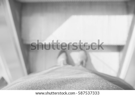 Picture blurred  for background abstract and can be illustration to article of people use escalator