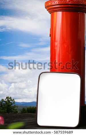 white blank frame and red post office box on natural background. Blank screen with copy space