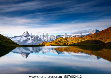 Great view of the snow rocky massif. Popular tourist attraction. Dramatic and picturesque scene. Location place Bachalpsee in Swiss alps, Grindelwald valley, Bernese Oberland, Europe. Beauty world.