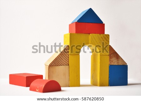 wood bricks building children's toys wooden cubes on a white background Royalty-Free Stock Photo #587620850