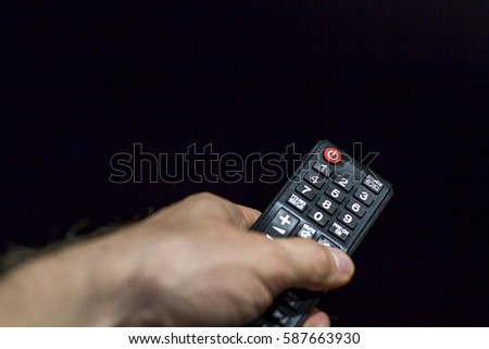 remote control Royalty-Free Stock Photo #587663930