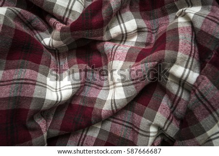 Close-up background of plaid with vignetting