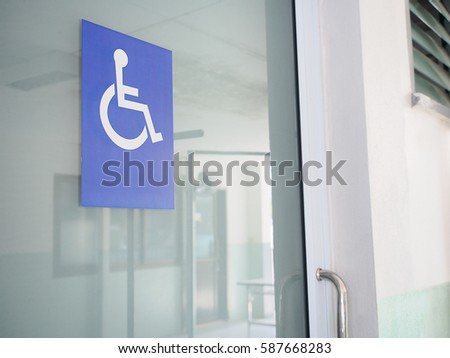 Toilet door with disability sign  in hospital