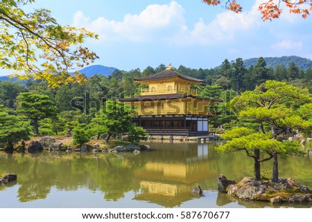 Kinkakuji Temple (Golden Temple) with green garden in summer, very famous Zen temple in Kyoto, Japan.
