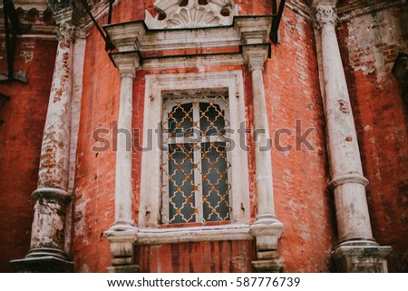 The old red building with window. Architecture