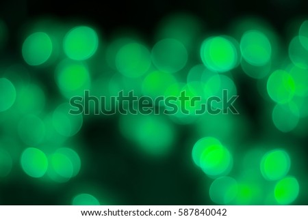 Defocused green abstract Glitter Lights bokeh Background
