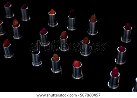 Lipstick set isolated on black background